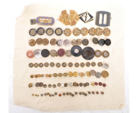 An assorted collection of Victorian, Georgian and later 20th century buttons and buckles. The lot to include Georgian enamel 