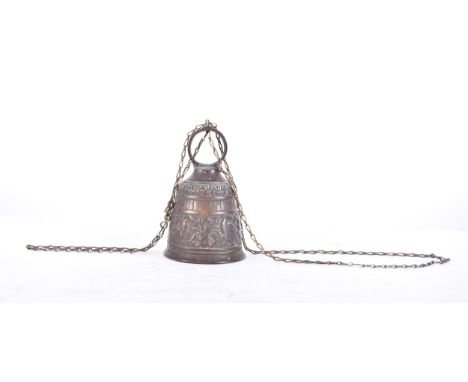 A 19th century heavy brass ecclesiastical bell/church bell/knocker with chain, the bell is decorated with embossed figure of 