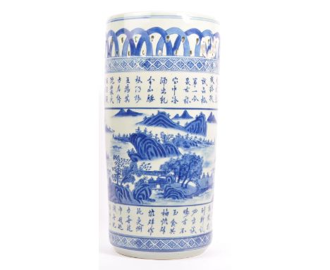 A 20th century Chinese hand painted porcelain blue and white umbrella stick stand. The umbrella stand having pierced details 