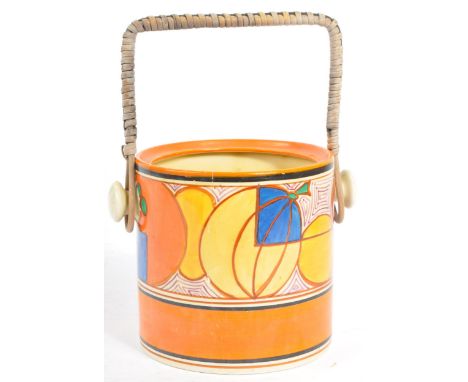 A 20th century circa 1930s Clarice Cliff Fantasque biscuit barrel in the Melons pattern. The biscuit barrel having an orange 