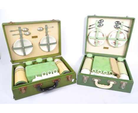 A complete retro vintage mid 20th Century British Brexton picnic hamper case. Cheney case complete with original knives, fork