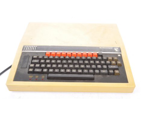 A vintage British Broadcasting Corporation BBC Microcomputer / Micro computer console by Acorn Computers Ltd of Cambridge. In