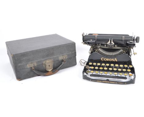 An early 20th century circa 1920s Corona Type 3 typewriter. The typewriter having a black painted metal body, complete with l