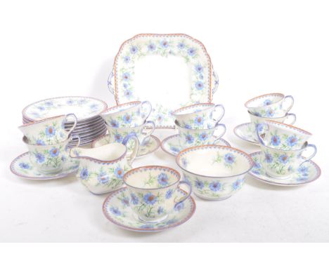 An early 20th century circa 1930s Aynsley fine bone china Cornflower tea service. The service featuring a white ground with p