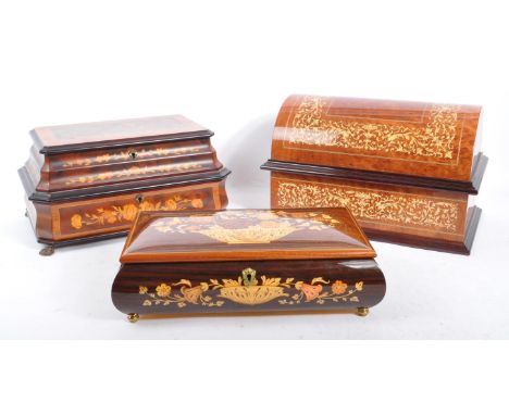 A collection of three vintage 20th century wooden jewellery musical boxes. Including a polyphon with discs, and two marquetry