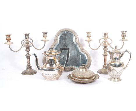 A collection of late 19th century and later silver plated items. Comprising an antique mirror plateau / cake stand, pair of s