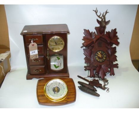 A Jewellery chest and clock combined , cuckoo clock and wall barometer. (3)