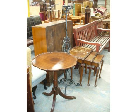 A Nest of three mahogany tea tables, a wrought iron lamp standard and a reproduction mahogany wine table.(3)