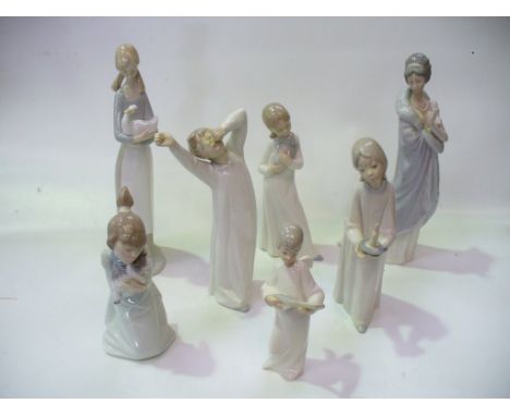 Seven assorted Nao and Lladro figures to include a Lladro figure of a girl holding chamber stick and a Nao figure of a girl h