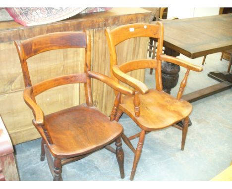 A Victorian elm ladder back elbow chair and a second similar chair. (2)