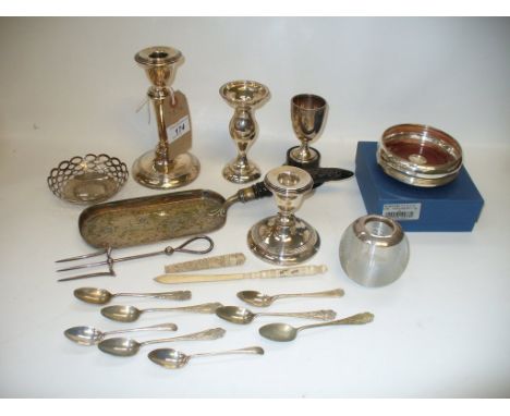 A Collection of silver items including a weighted table candlestick, a weighted dwarf candlestick, weighted vase, silver rimm