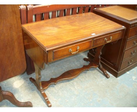 A Reproduction mahogany sofa table with two frieze drawers.