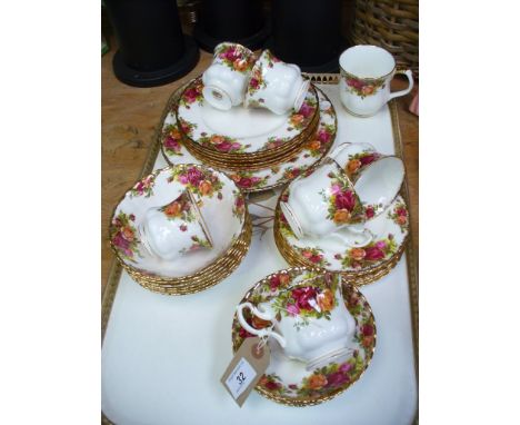 A quantity of Royal Albert "Old Country Roses" tea and dinner wares including cups, saucers, dinner and side plates, dessert 