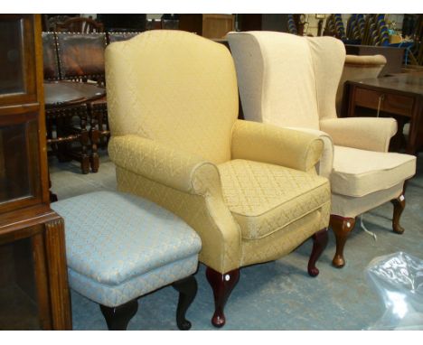 A Modern " Jade " fireside armchair, a wing back fireside chair and a foot stool. (3)