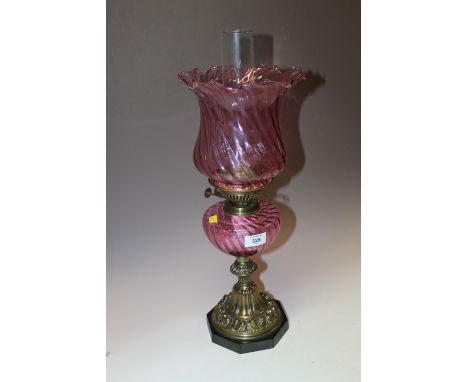A DECORATIVE PINK GLASS + BRASS OIL LAMP  A/F