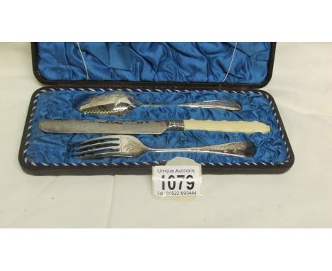 A Victorian cased christening set being knife fork and spoon