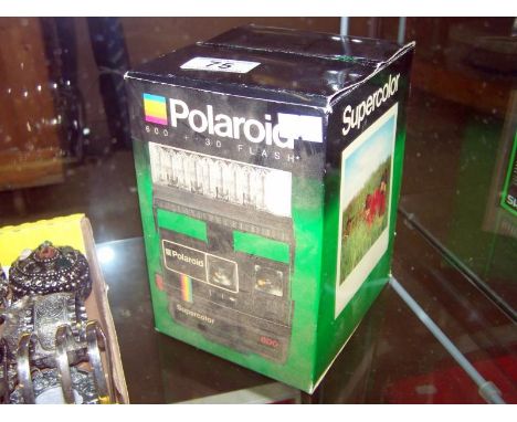 A boxed Polaroid supercolour 600