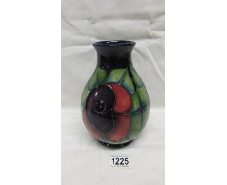 A Moorcroft rose vase, Sally Tuffin design, first quality