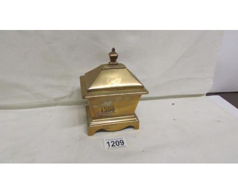 A heavy Victorian brass tea caddy