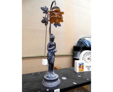 An Art Nouveau style figurine table lamp