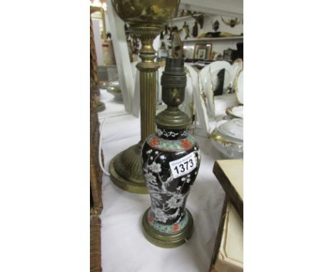 An early 20th century Chinese vase table lamp with brass fittings