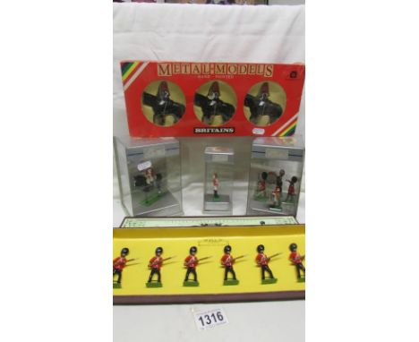 A quantity of boxed Britian's soldiers including 8805 Irish Guards, Mounted Horse Guards, Scotch Guards etc