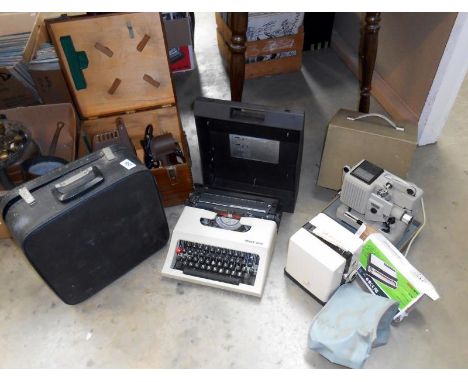 2 cine projectors, 1 slide projector, 2 typewriters and a stylophone