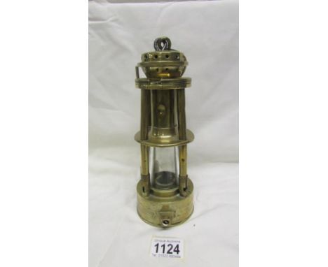 A rare late 19th century all brass miner's lamp by Davis of Derby