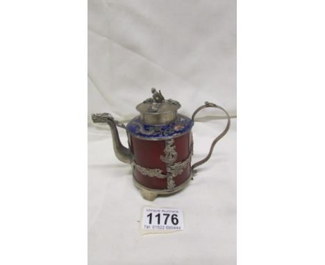 A fine antique Chinese metal teapot of jade, white metal and cloissonne. The lid decorated in relief with frogs and a monkey 