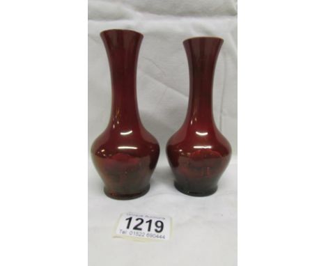 A pair of Ruby lustre hazeldene flambe' vases by William Moorcroft, made for Liberty circa 1907