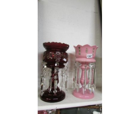 A pink glass lustre (chips to edge) and a ruby glass lustre both with drops