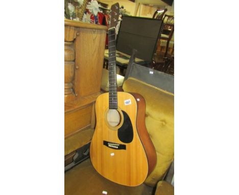 A tanglewood acoustic guitar