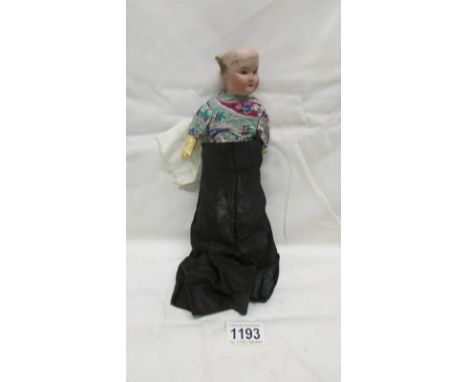 A late 19th / early 20th century French bisque head doll, missing 1 leg and hair