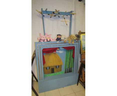 A string puppet theatre The 3 Little Pigs