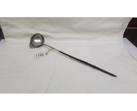 A Georgian toddy ladle with worn markings