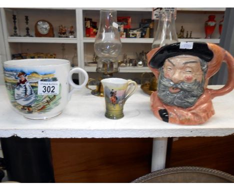 A Royal Doulton Falstaff character jug, a small 2 handled jug with hunting scene and a large mug
