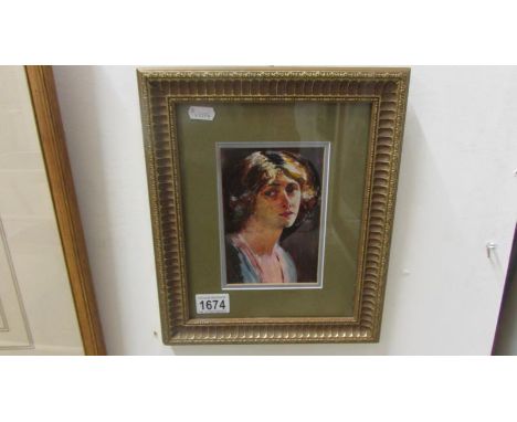 An early 20th century portrait of a lady possibly by Frederick Bloser