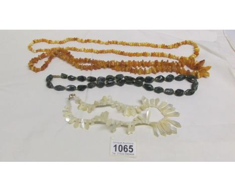 2 yellow amber necklaces, a vintage mother of pearl necklace and a lace agate necklace