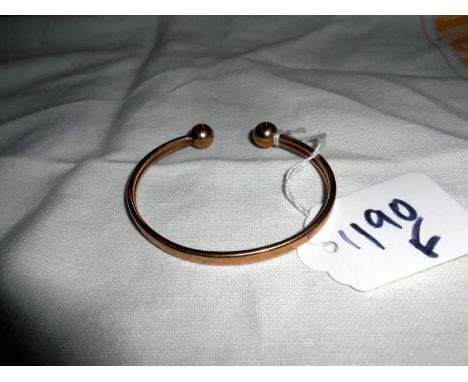 A 9ct gold bangle (10 gms)