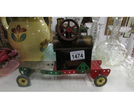 A Mamod steam engine mounted on a Meccano chassis