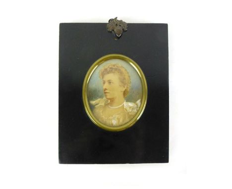 A late 19th/early 20th century miniature watercolour portrait of a young lady, in an ebonised and gilt frame, 12.5 x 16 cm  