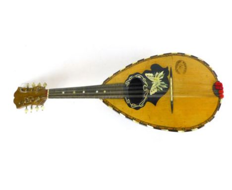 A mid 20th century mother of pearl inlaid mandolin, bearing stamp 'Grasso Toscano santi, Catania-Sicilia' in original carry c