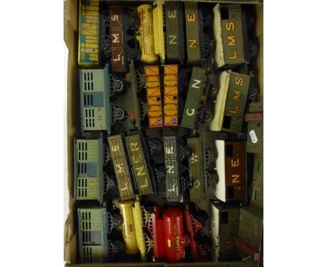 A quantity of Hornby series tin plate model railway carriages to include Shell oil containers etc