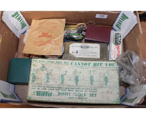 A Biffit golf set; a harmonica and various other items