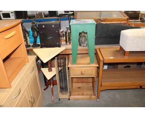 A pine bedside cabinet; a decorated stool; a CD rack etc.