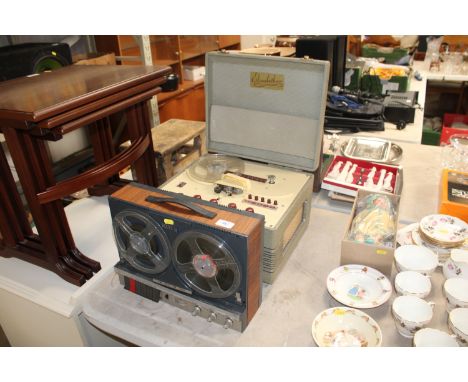 An Elizabethan reel to reel tape recorder AF and a two speed four track tape recorder, both sold as collectors items