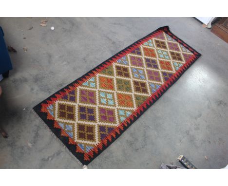 An approx. 192cms x 64cms Maimana Kilim runner