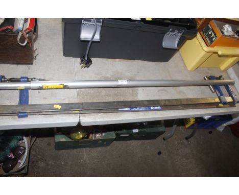 Two Record clamps and a telescopic measuring stick
