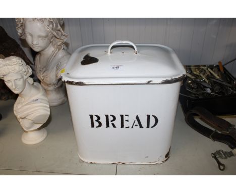 A vintage enamel bread bin