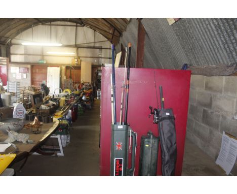 A quantity of fishing rods and hard plastic case
